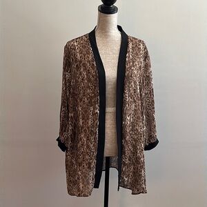 Signature collection animal print size 1X shrug/cover-up. Excellent condition